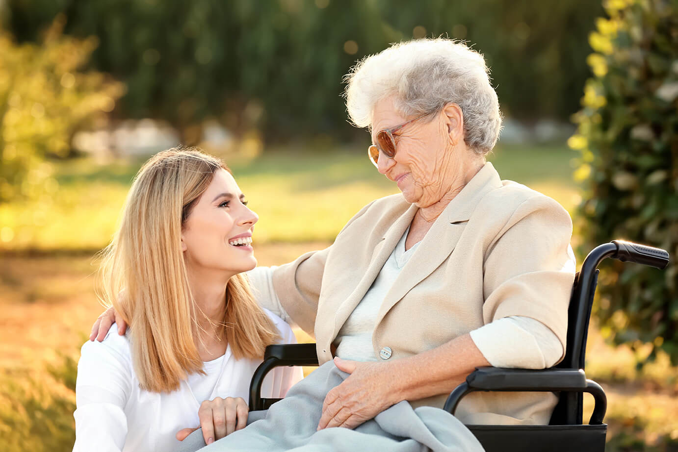 woman caring for elderly lady